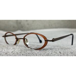 Theo Belgium Eyeglasses Spectacles Mod. Barrel Knot 115 Slim Oval Orange Metal